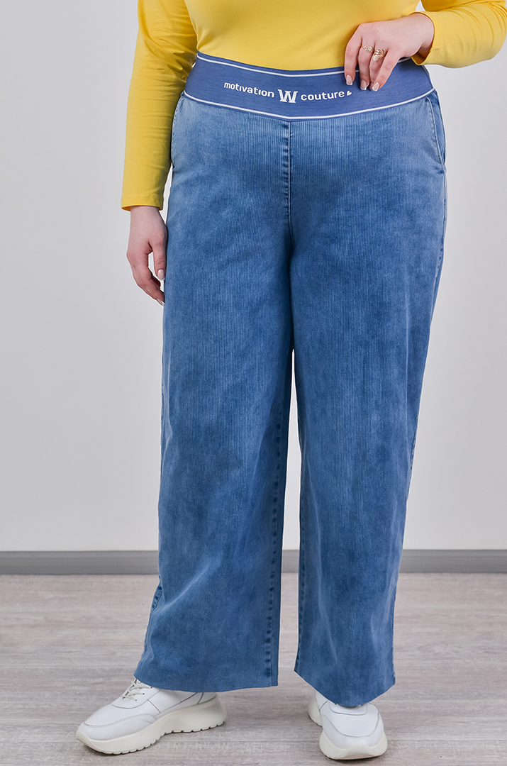 Широкі джинси з фактурними вертикальними лініями великих розмірів