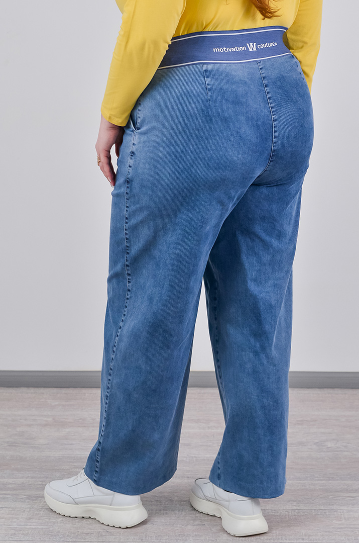 Широкі джинси з фактурними вертикальними лініями великих розмірів