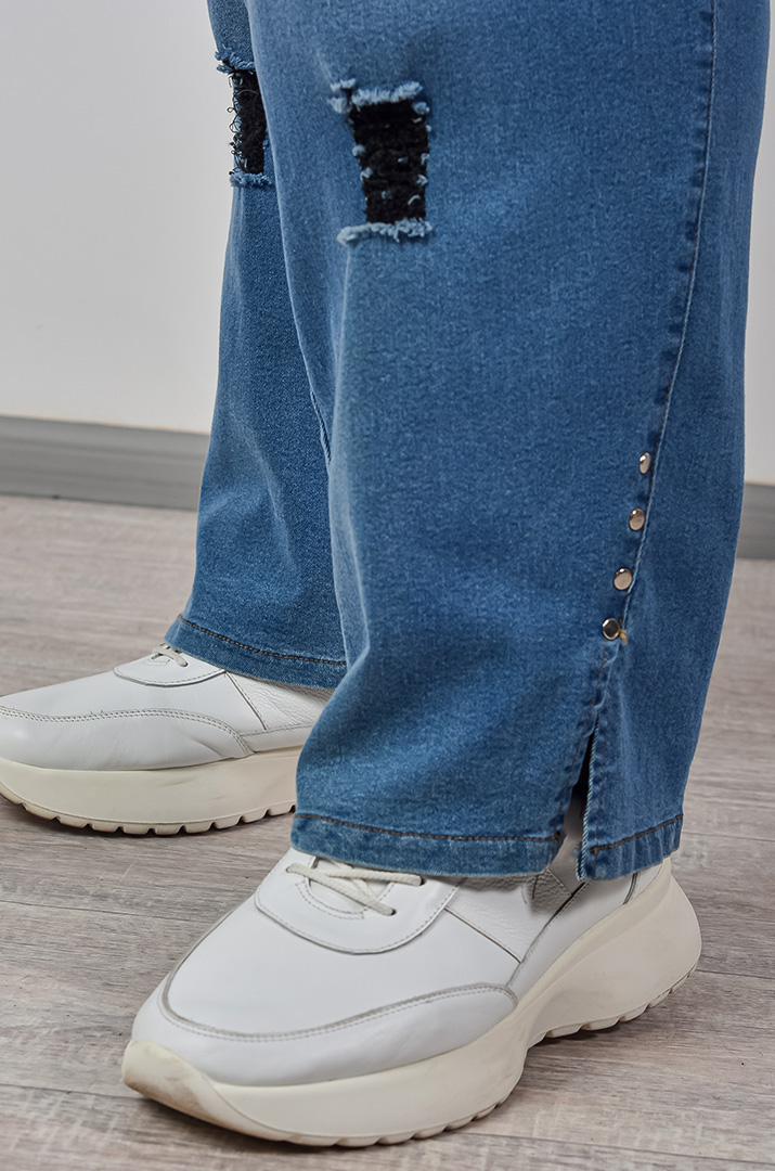 Джинси завужені з декоративними потертостями великих розмірів