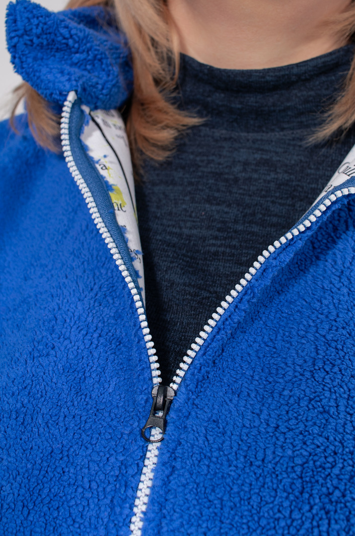 Однотонний кожушок з високим коміром на блискавці батал