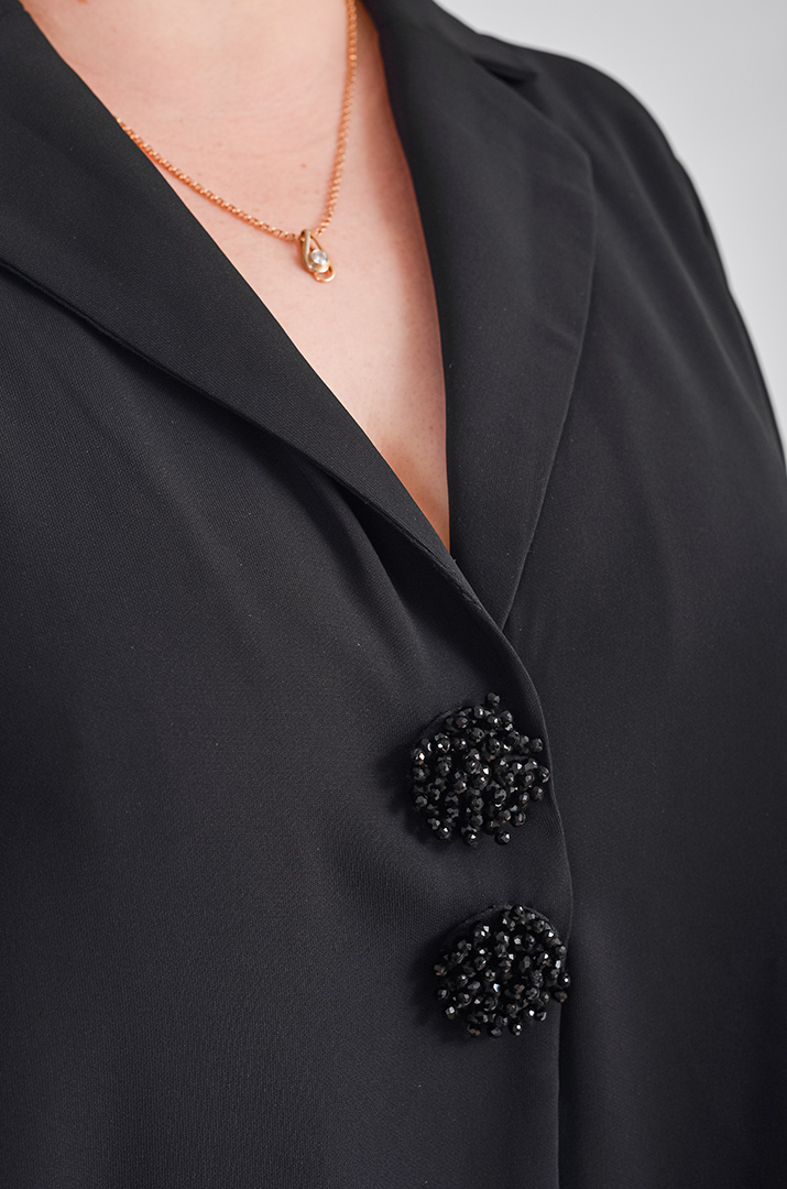 Брючний костюм з ефектними кнопками-застібками великих розмірів