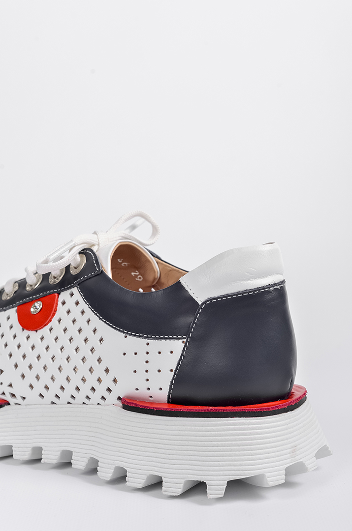 Яскраві кросівки великих розмірів