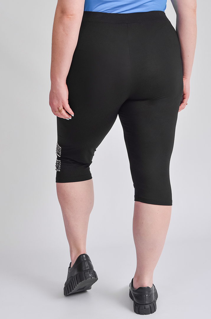 Лосини чорного кольору оздоблені аплікацією з камінців великих розмірів