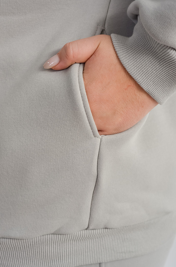 Мастерка в світло-сірому кольорі на блискавці великих розмірів