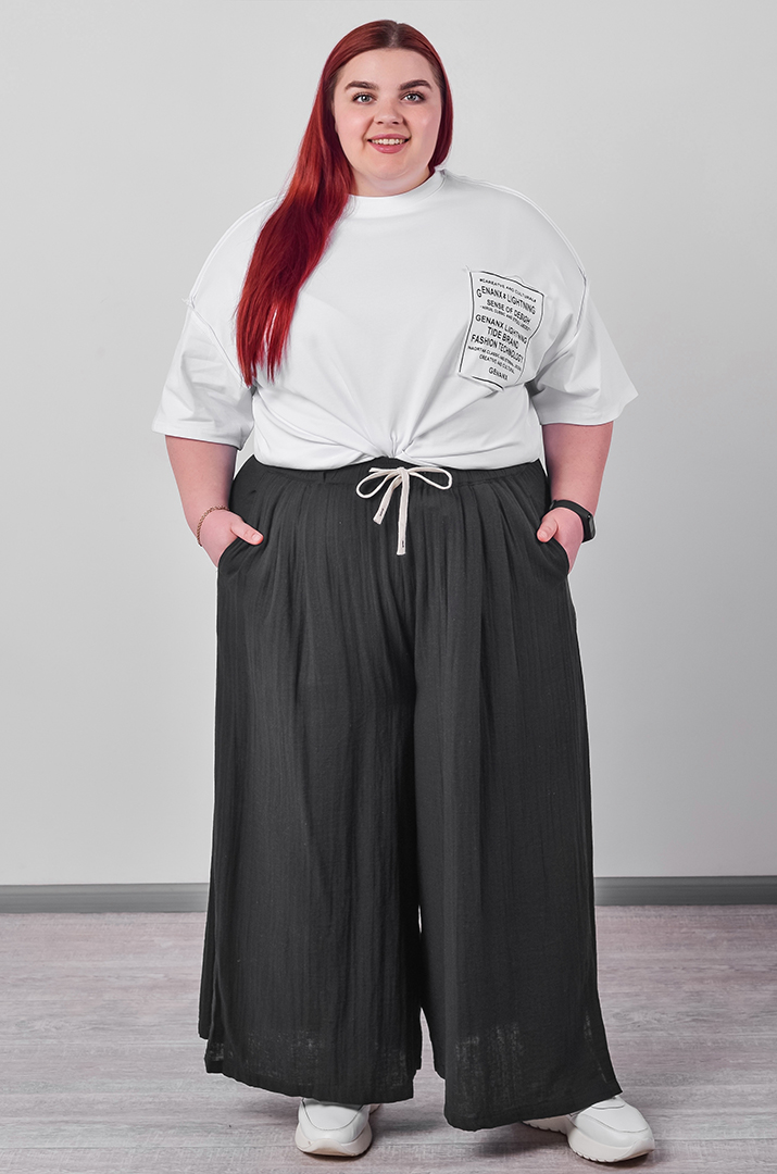 Брюки-спідниця з фактурної тканини на зав'язці великих розмірів