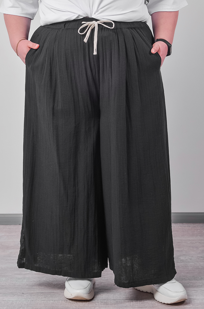 Брюки-спідниця з фактурної тканини на зав'язці великих розмірів