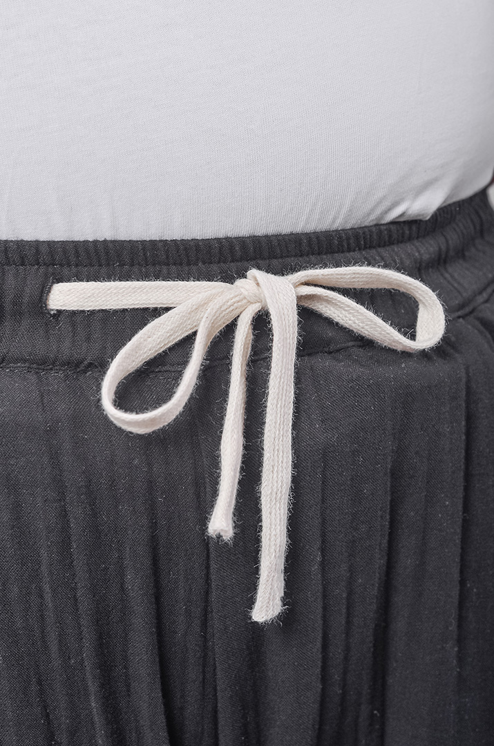 Брюки-спідниця з фактурної тканини на зав'язці великих розмірів