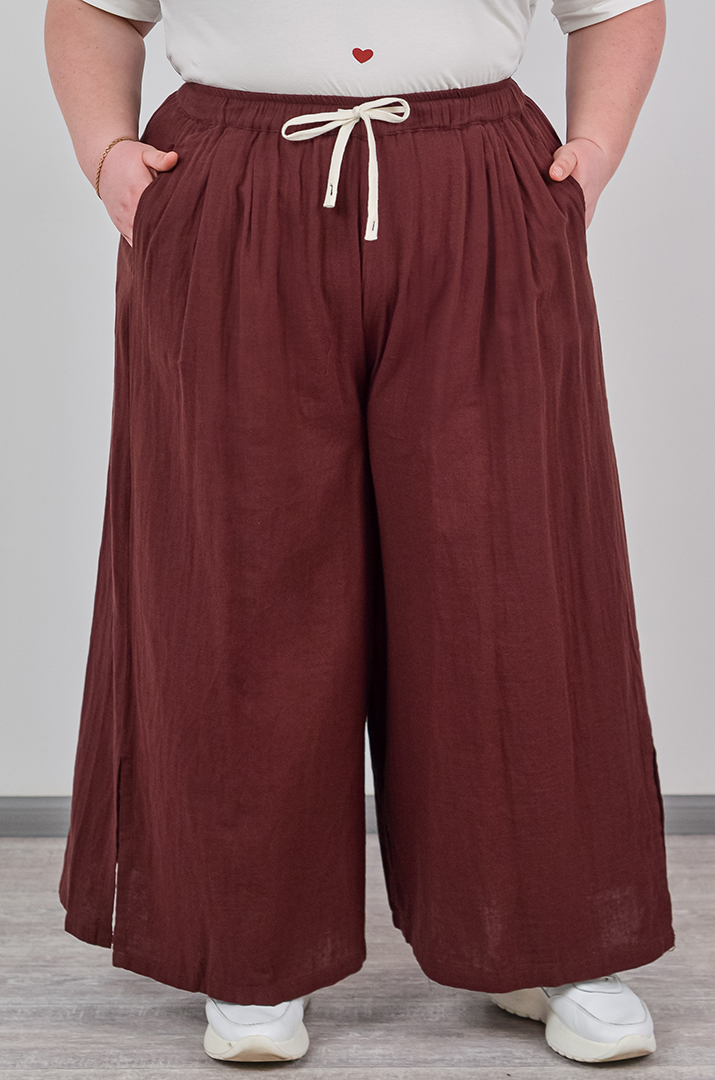 Брюки-спідниця з фактурної тканини на зав'язці великих розмірів