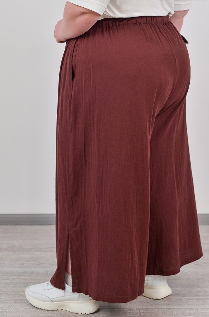 Брюки-спідниця з фактурної тканини на зав'язці великих розмірів