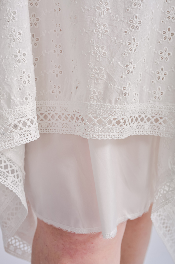 Спідниця міді білого кольору великих розмірів