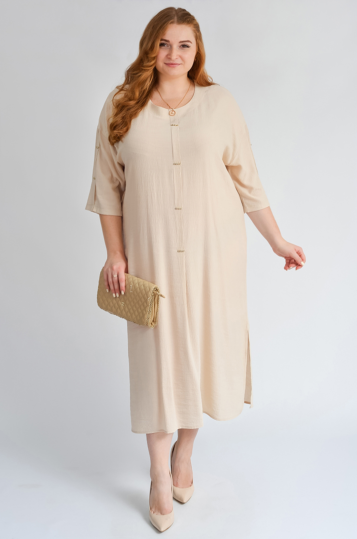 Лаконічна сукня міді з декоративними елементами великих розмірів