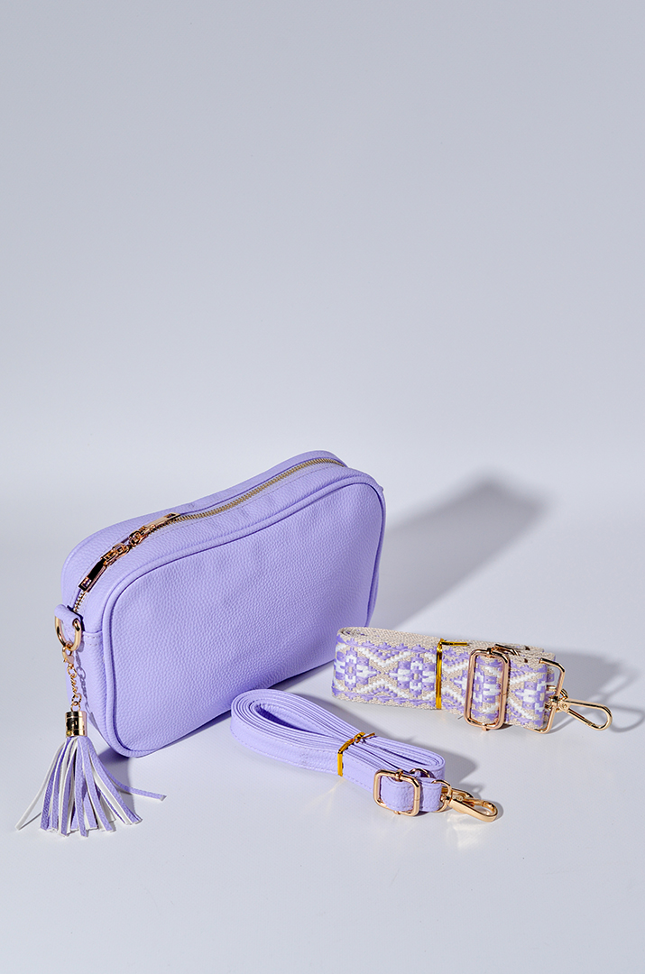 Сумка з екошкіри зі змінними ременями та з декративною китицею