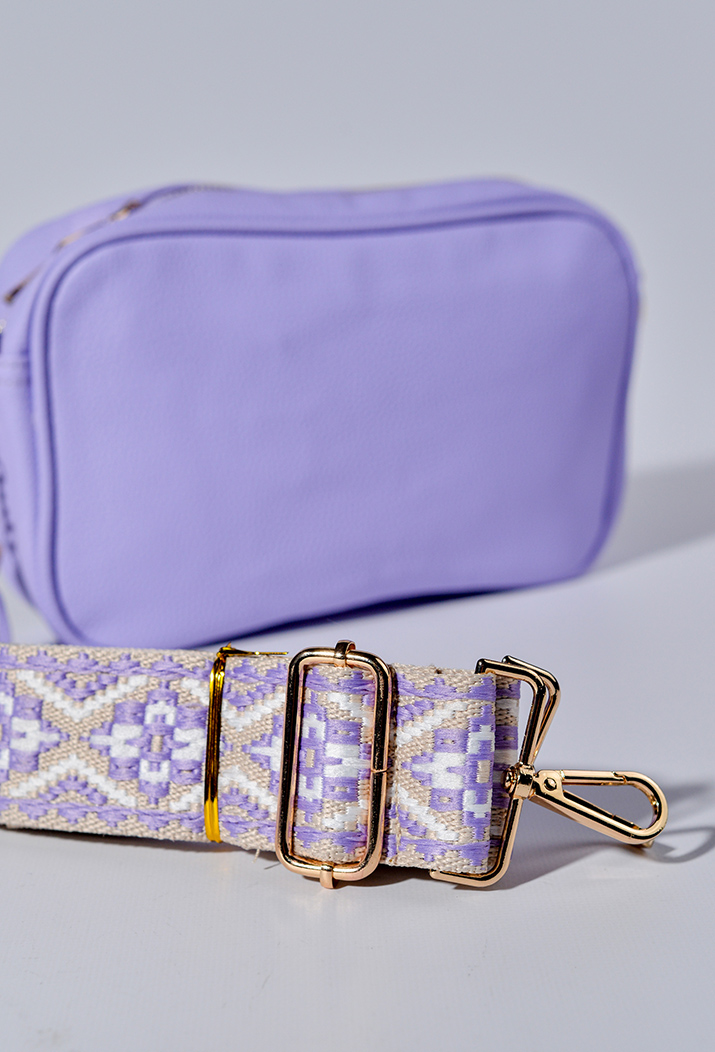 Сумка з екошкіри зі змінними ременями та з декративною китицею