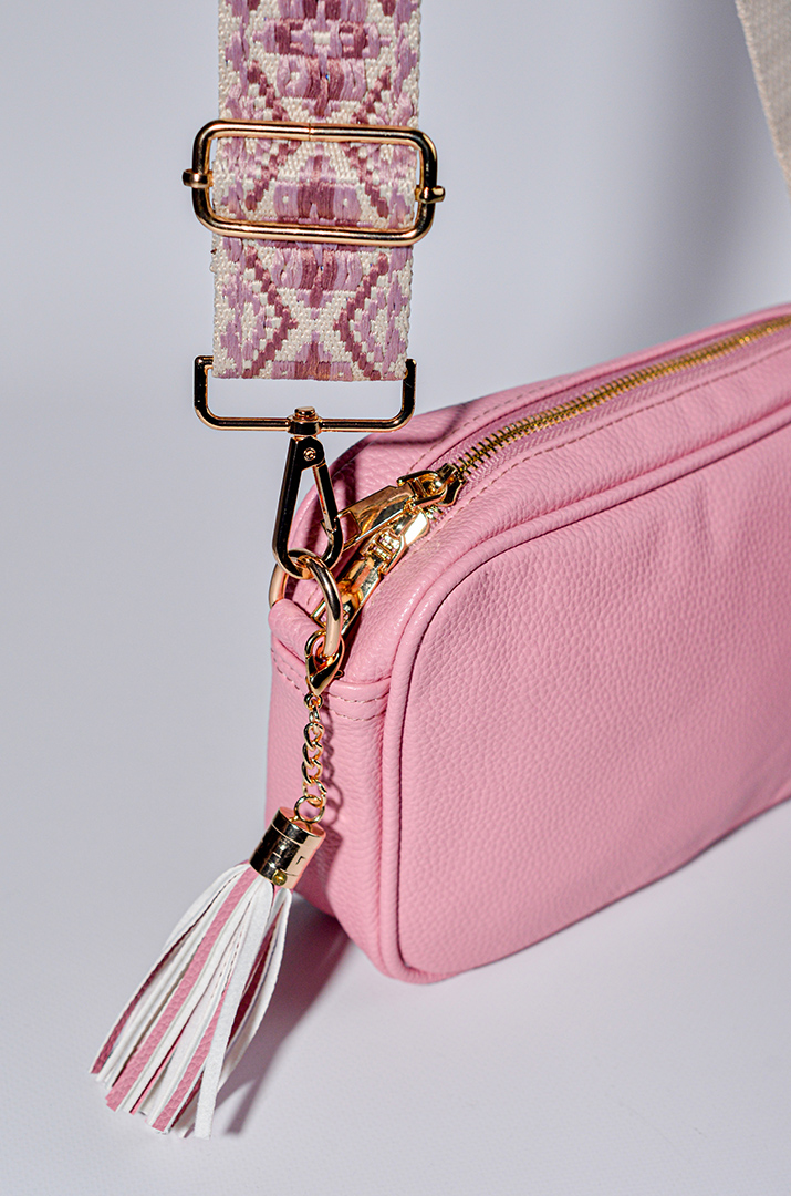 Сумка з екошкіри зі змінними ременями та з декративною китицею