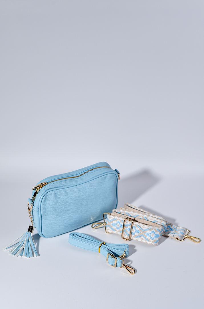 Сумка з екошкіри зі змінними ременями та з декративною китицею