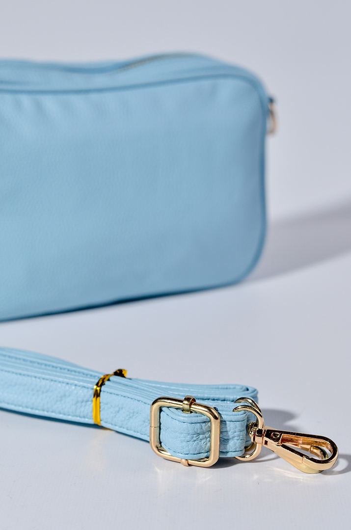 Сумка з екошкіри зі змінними ременями та з декративною китицею