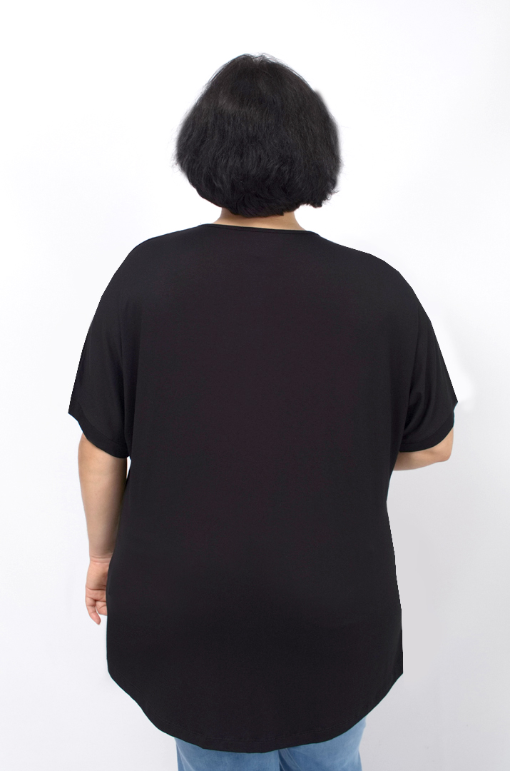 Трикотажна туніка в принт з блискітками батал