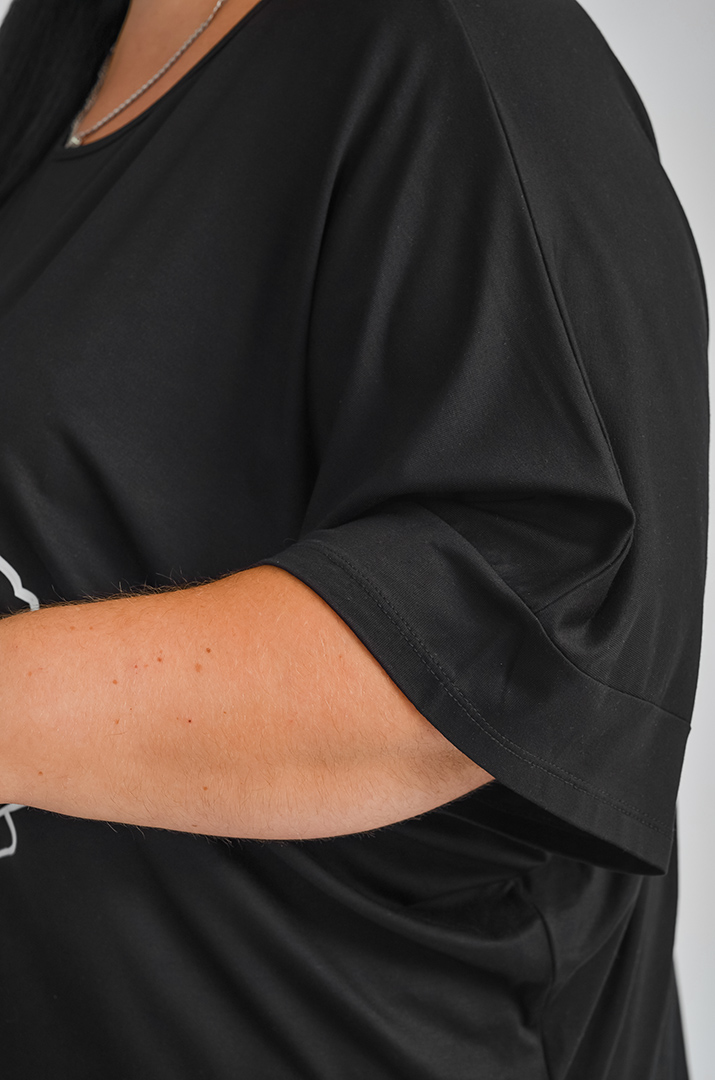 Чорна коротка туніка з яскравими квітами великих розмірів