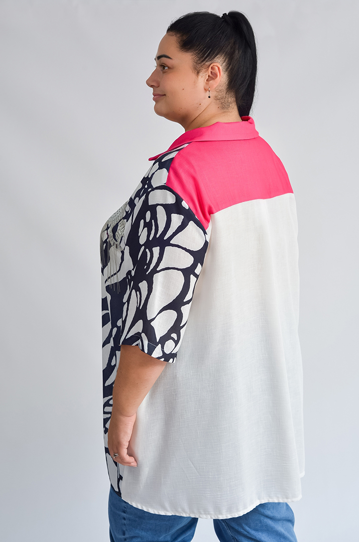 Туніка з абстрактним принтом та рожевими акцентами великих розмірів