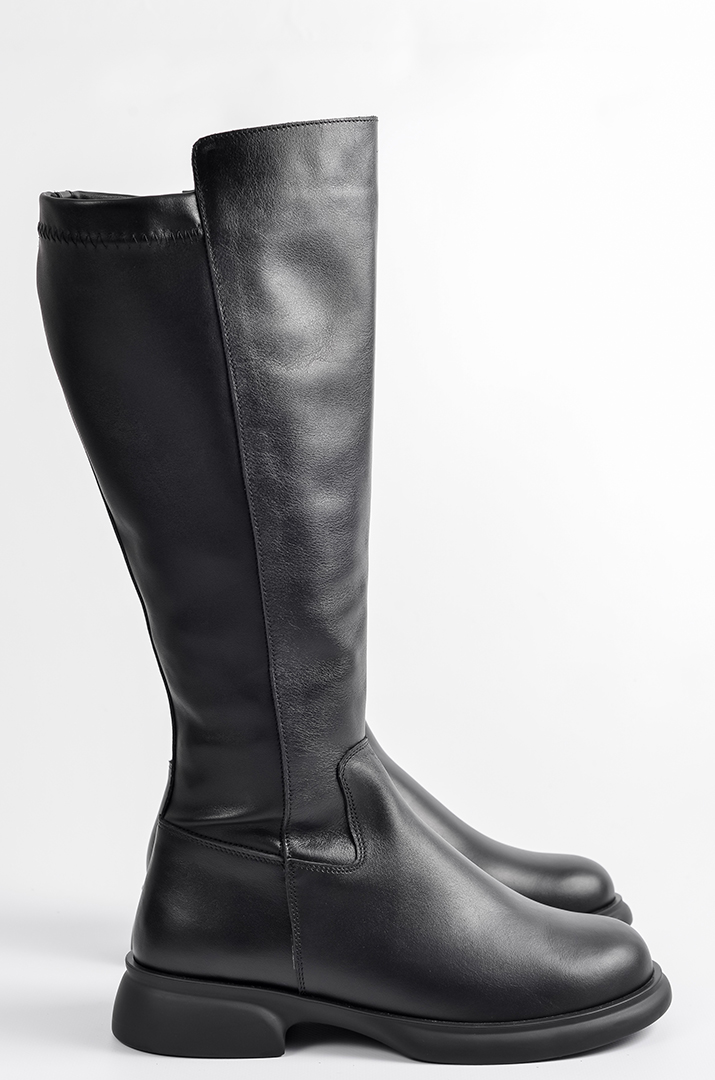 Високі шкіряні чоботи на підборах великих розмірів