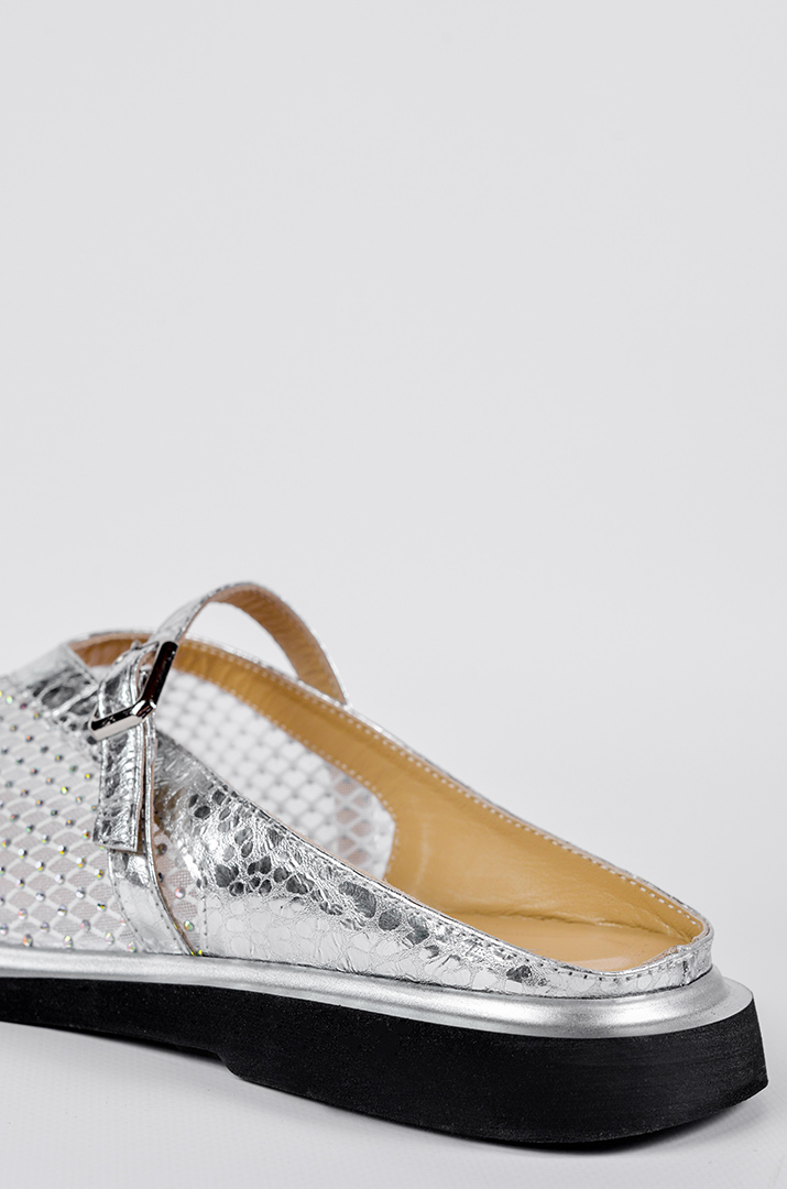 Мюлі в сріблястому відтінку з декоративними камінцями великих розмірів